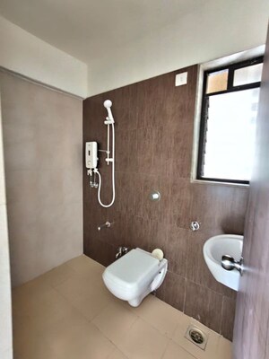 Bathroom in 2 BHK Apartment at Unnathi Woods Phase 3, Ghodbunder Road – for Sale