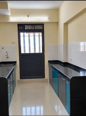 Kitchen in 2 BHK Apartment at Rustomjee Avenue M, Virar West – for Rent