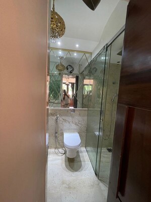 Bathroom in 1.5 BHK Apartment at Lokhandwala Complex – for Rent