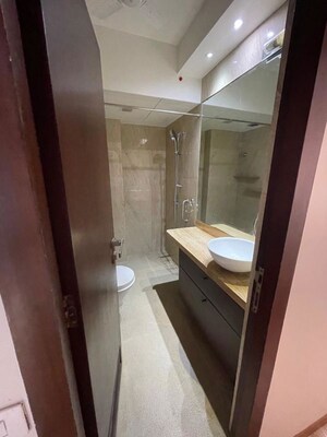 Bathroom in 1.5 BHK Apartment at Lokhandwala Complex – for Rent