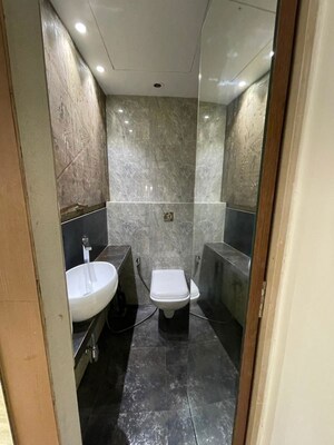 Bathroom in 1.5 BHK Apartment at Lokhandwala Complex – for Rent