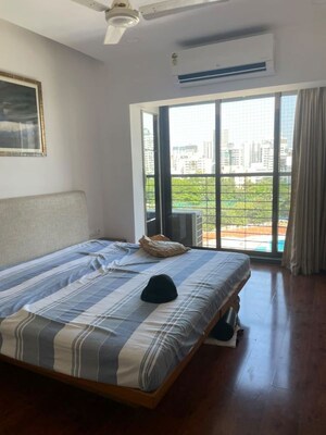 Bedroom in 3 BHK Apartment at Andheri CHS, Andheri West – for Rent