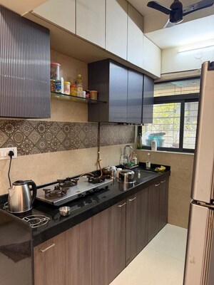Kitchen in 1 BHK Apartment at Omkar Signet, Malad East – for Rent