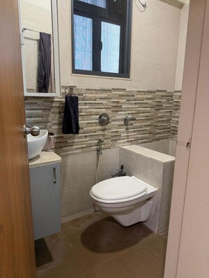Bathroom in 1 BHK Apartment at Omkar Signet, Malad East – for Rent