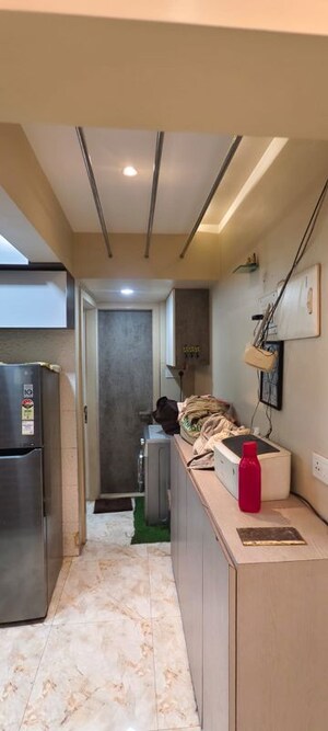 Laundry Area in 1 BHK Apartment at Omkar Signet, Malad East – for Rent