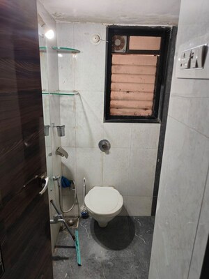 Bathroom in 2.5 BHK Apartment at Shree Satya Shankar Residency, Manpada – for Rent