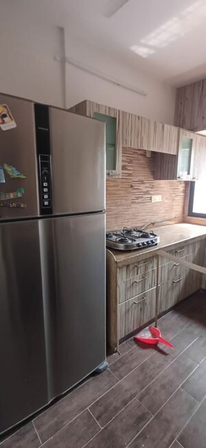 Kitchen in 3 BHK Apartment at Andheri CHS, Andheri West – for Rent