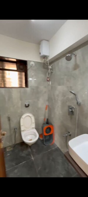 Bathroom in 3 BHK Apartment at Andheri CHS, Andheri West – for Rent