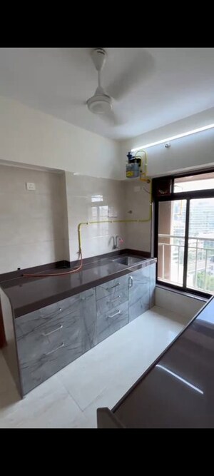 Kitchen in 3 BHK Apartment at Andheri CHS, Andheri West – for Rent