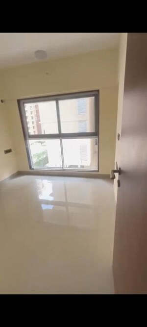 Room in 2 BHK Apartment at Andheri CHS, Andheri West – for Rent