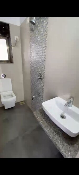 Bathroom in 3 BHK Apartment at Andheri CHS, Andheri West – for Rent