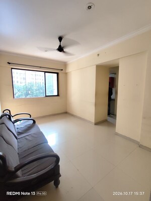 Living Room in 2 BHK Apartment at Puranik Hometown Phase II, Ghodbunder Road – for Sale
