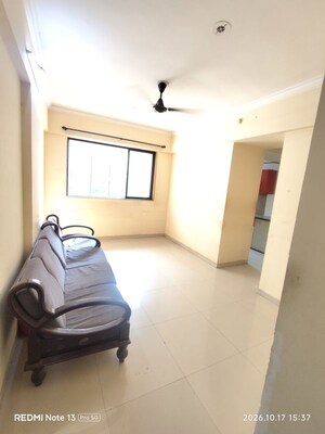 Living Room in 2 BHK Apartment at Puranik Hometown Phase II, Ghodbunder Road – for Sale