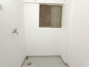 Utility Room in 2 BHK Apartment at Gera Emerald City, Kharadi – for Rent