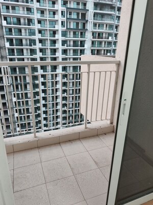 Balcony in 2.5 BHK Apartment at Godrej Nest, Sector 150 – for Rent
