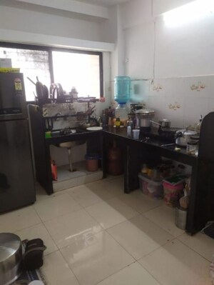 Kitchen in 2 BHK Apartment at Shree Ganesh Vihar, Dhanori – for Rent