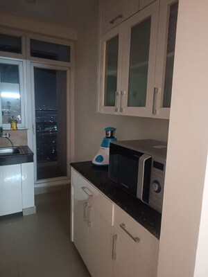 Kitchen in 3.5 BHK Apartment at 3C Lotus Boulevard, Sector 100 – for Rent