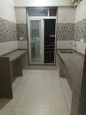 Kitchen in 2 BHK Apartment at Welkin Mannat, Ghansoli – for Rent