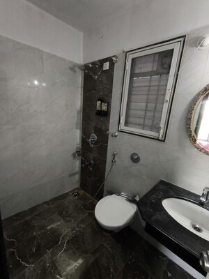 Bathroom in 2 BHK Apartment at Palladium Homes, Dhanori – for Rent