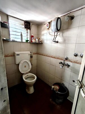 Bathroom in 1.5 BHK Apartment at Yellow Ribbon CHS, Dahisar West – for Sale