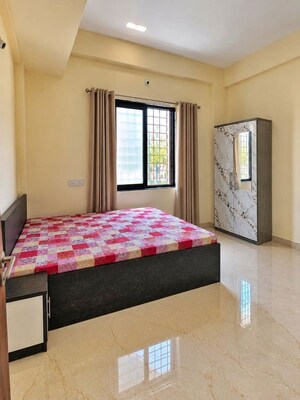 Bedroom in 1 BHK Apartment at Wadgaon Sheri – for Rent