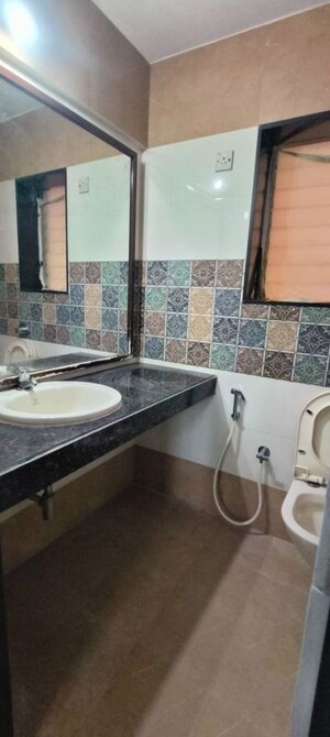 Washroom in 2 BHK Apartment at Crystal Garden Estate CHS, Manpada – for Rent