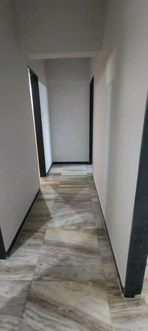Room in 2 BHK Apartment at Crystal Garden Estate CHS, Manpada – for Rent