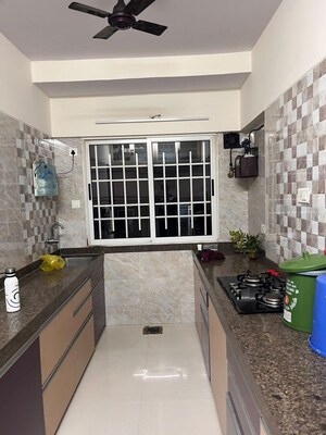 Kitchen in 2 BHK Apartment at Poddar Shri Ganesh Apartment, Goregaon West – for Rent
