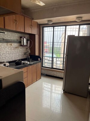 Kitchen in 2 BHK Apartment at Seawood Classic, Kharghar – for Rent