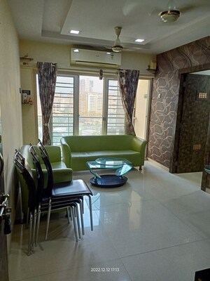 Living Room in 2 BHK Apartment at Micro Srishti, Bhandup West – for Rent