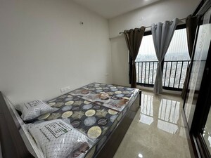 Bedroom in 2 BHK Apartment at Duville Riverdale Grove, Kharadi – for Rent