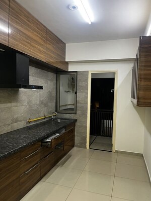 Kitchen in 3 BHK Apartment at HN Safal Applewoods Orchid heights, Sp Ring Road – for Sale