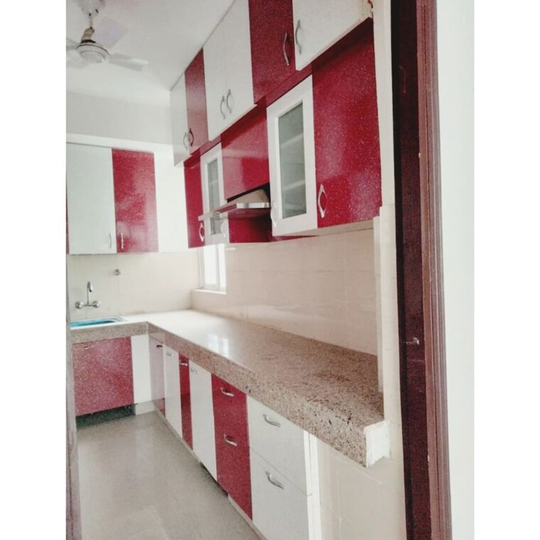Kitchen, logix-blossom-greens 2.5 Bedroom 1234 Sq.Ft. Apartment In Sector 143 Noida 10765352
