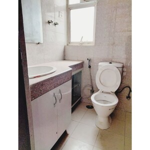 Bathroom in 2.5 BHK Apartment at Logix Blossom Greens, Sector 143 – for Sale