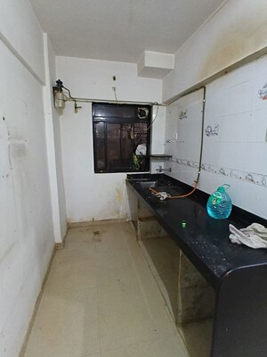 Kitchen in 1 BHK Apartment at Garden Tower, Kandivali East – for Rent