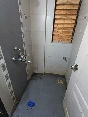 Bathroom in 1 BHK Apartment at Garden Tower, Kandivali East – for Rent