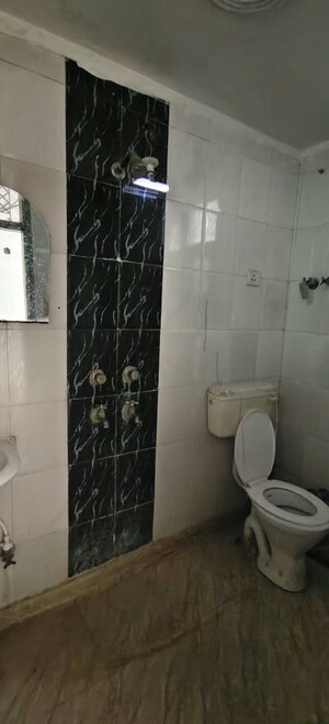 Bathroom in 2 BHK Builder Floor at Dwarka Mor – for Rent