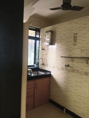 Building Lobby in 1 BHK Apartment at Vile Parle West – for Rent