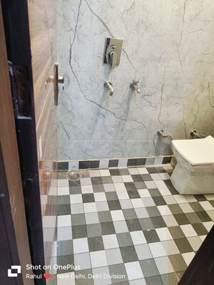 Bathroom in 4 BHK Builder Floor at Dwarka Mor – for Rent