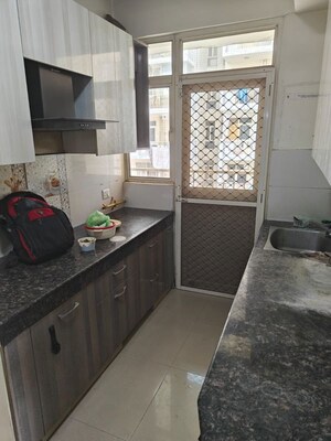 Kitchen in 2 BHK Apartment at Nilaya Greens, Raj Nagar Extension – for Sale