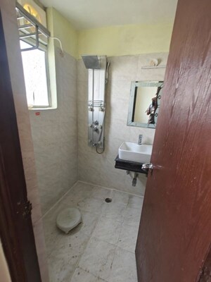 Bathroom in 2 BHK Apartment at Nilaya Greens, Raj Nagar Extension – for Sale