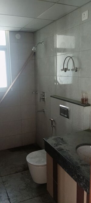Bathroom in 3.5 BHK Apartment at Godrej Nest, Sector 150 – for Rent