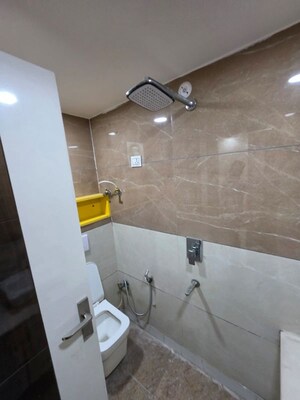 Bathroom in 3 BHK Builder Floor at Dwarka Mor – for Rent