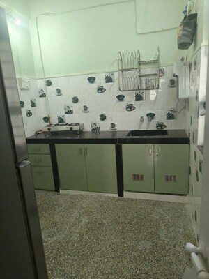Kitchen in 2 BHK Apartment at The Vivekanand CHS, Mahim – for Rent