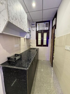Kitchen in 1 RK Apartment at Maruti Vihar Saraswati Vihar, Saraswati Vihar – for Rent