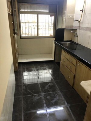 Kitchen in 1 BHK Apartment at Galaxy Heights, Goregaon West – for Rent