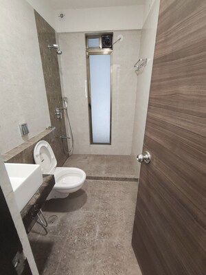 Bathroom in 3 BHK Apartment at Raj Infinia, Malad West – for Rent