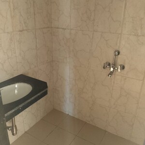 Bathroom in 2 BHK Apartment at Shree Ram Samarth CHS, Goregaon West – for Rent