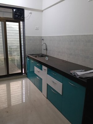 Kitchen in 2 BHK Apartment at New Satara CHS kharghar, Kharghar – for Rent