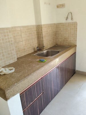 Kitchen in 3 BHK Apartment at Emaar Gurgaon Greens, Sector 102 – for Sale